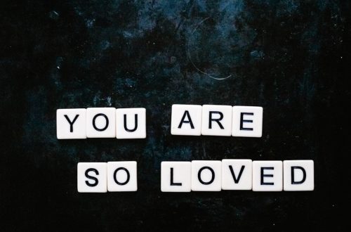 You are so loved spelt out using Scrabble letters flatlay